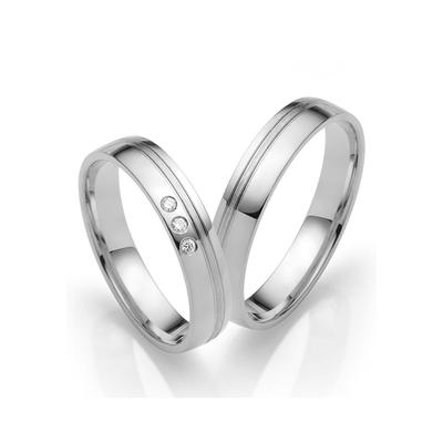 Trauring FIRETTI "Schmuck Geschenk Gold 750 Hochzeit Ehering "LIEBE" Gr. 62, weiß (weißgoldfarben), Fingerringe, 62, 0,03 ct SI = kleine Einschlüsse mit Brillanten, Weißgold 375, 4mm, Made in Germany, wahlweise mit oder ohne Brillanten Image