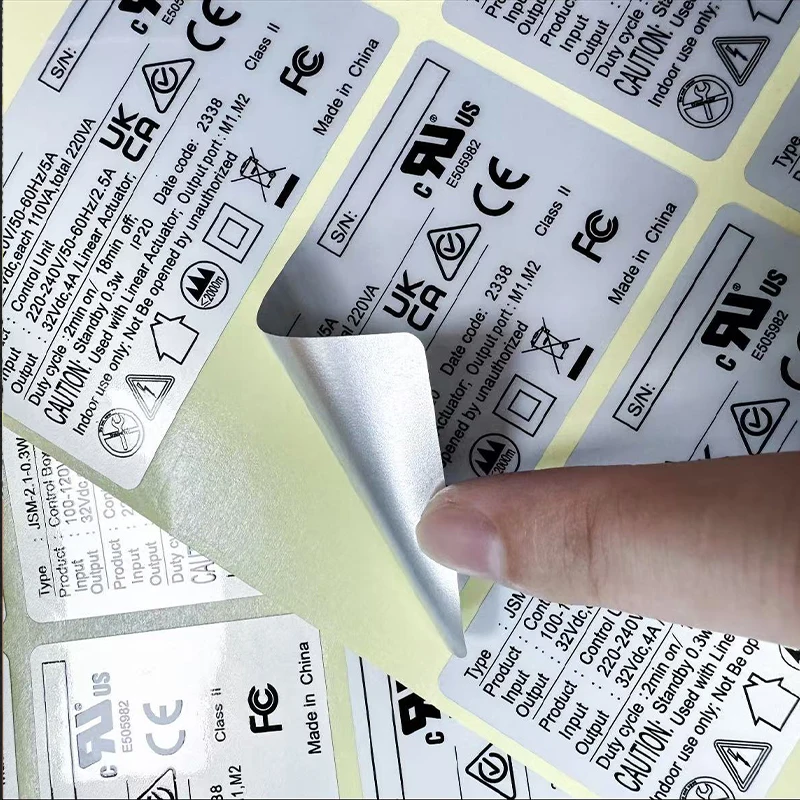 Personalisierte Aufkleber aus Silberpapier, wasserfest, ölbeständig, für kleine Unternehmen, mattsilberne Aufkleber, glänzendes silbernes PVC für elektronische Geräte Image