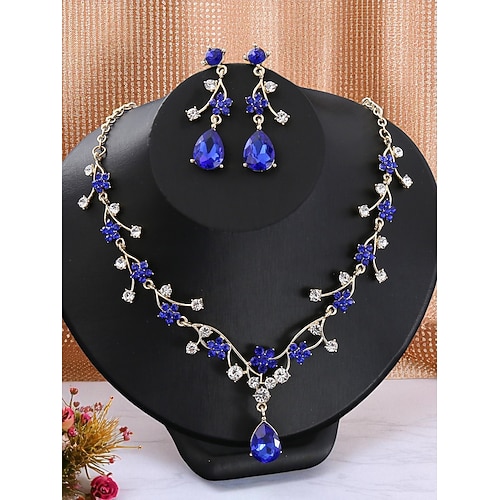 Goldfarbenes Set aus Halskette und Ohrringen mit Blumenmuster für Damen mit violetten und klaren Kristallen, eleganter Schmuck für Partys und besondere Anlässe Image