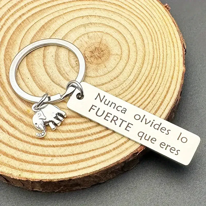 Elefanten-Schlüsselanhänger aus Edelstahl, „Never Don't Forget Strong“, inspirierender Schlüsselanhänger mit positiver Energie für die Dekoration von Autos und Rucksäcken Image