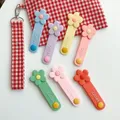 Simpatico organizzatore di cavi con fiori in silicone per telefono Linea USB Avvolgitore con fibbia Protezione per cavi Supporto per cavo di gestione dei cavi per auricolari