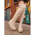 stivali con zeppa sopra il ginocchio in pelle scamosciata beige da donna: comode calzature invernali con plateau per lo street style e l'abbigliamento casual quotidiano