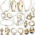 Scintillanti ciondoli dorati in argento sterling 925 set di geometrie orecchini di perle anelli bracciali a cuore collane regali di gioielli fai da te da donna