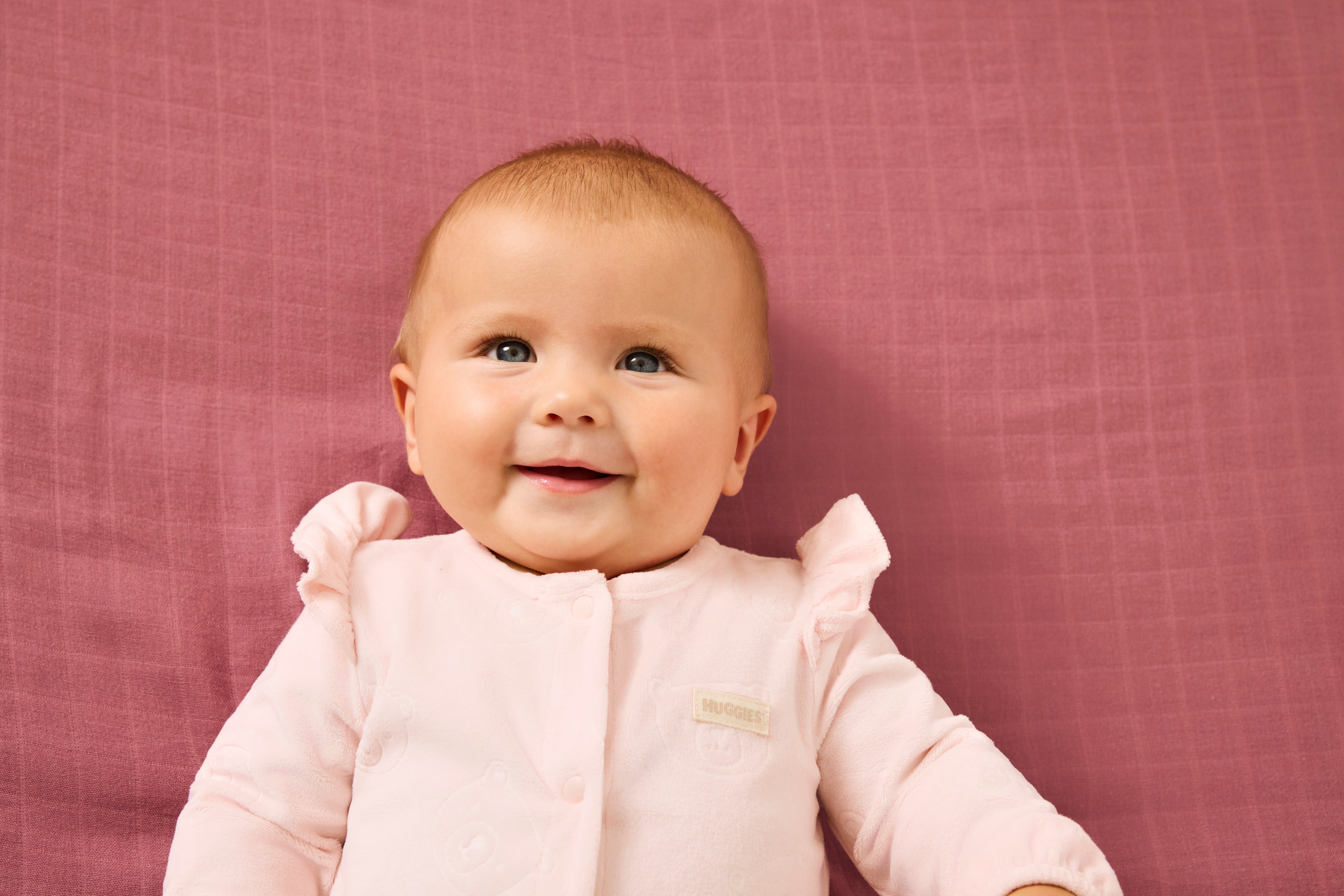 Strampler HUGGIES BABYWEAR "HUGG FOOTED COVERALL", Baby, Gr. 2, rosa (huggies crystal pink), Fleece, Obermaterial: 100% Polyester, lang, Rundhals, mit Gummizug, Overalls, Pflegeleichte Fleece- Qualität Image