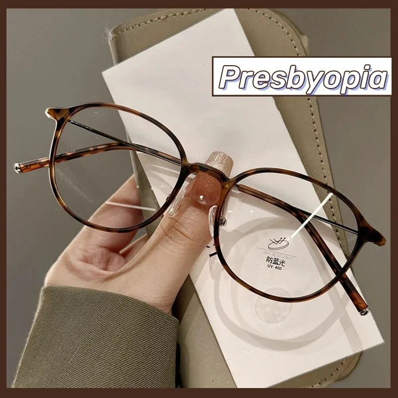 Lesebrille, Anti-Blaulicht-Presbyopie-Brille mit rundem Rahmen, runde Retro-Lesebrille, ultraleichte Unisex-Fernsichtbrille Image