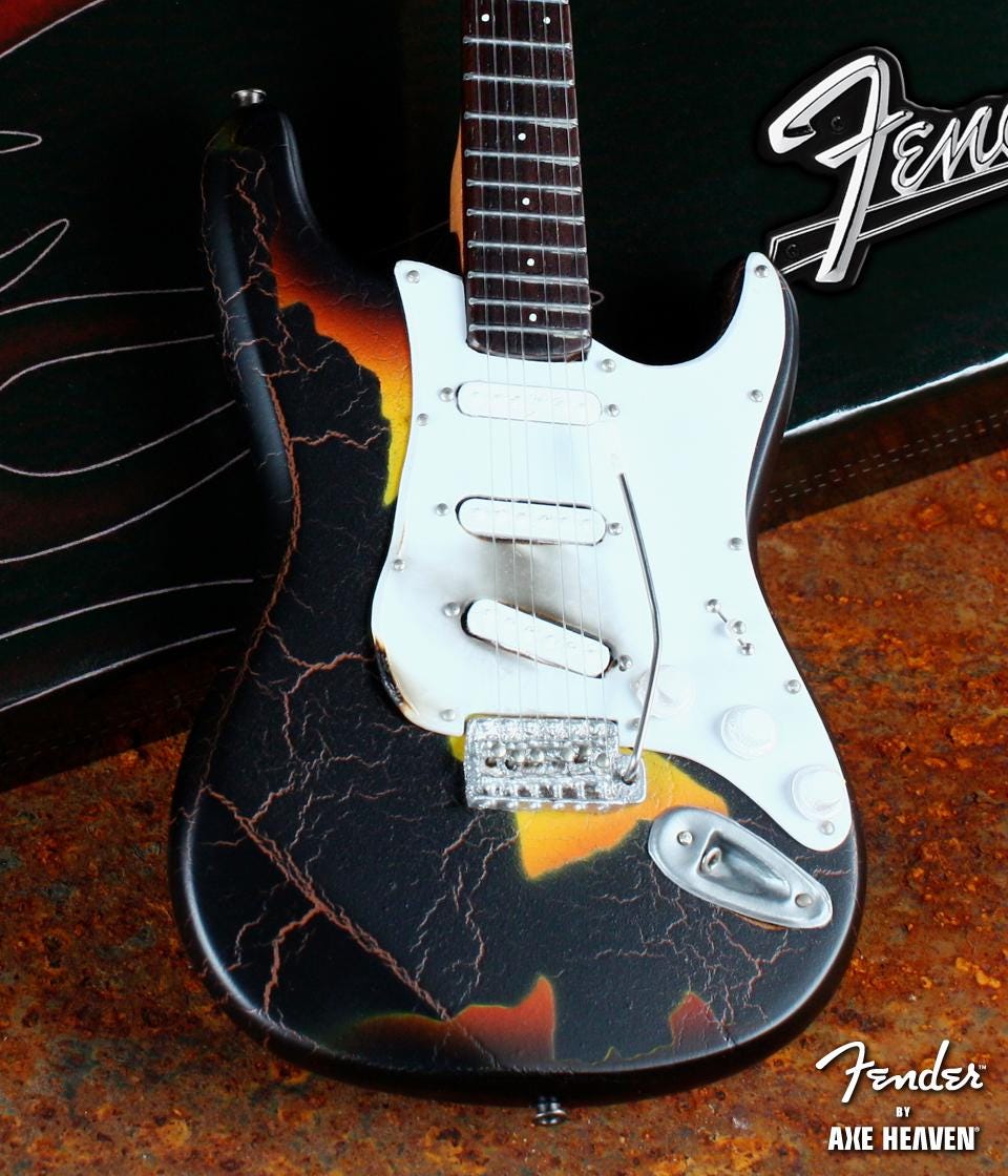 Replica del modello di chitarra Fender Strat Mini di Jimi Hendrix Burnt Guitar - Fender Jimi Hendrix con licenza ufficiale BY AXE HEAVEN