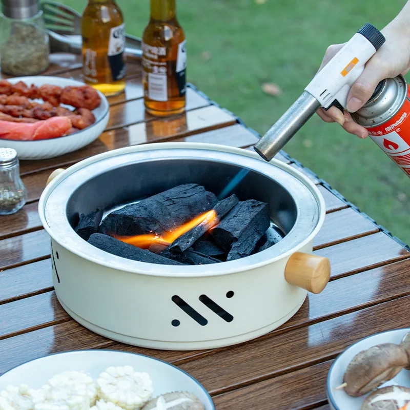 Barbecue-Grill, Heizkocher, tragbarer Internet-Promi-Ständer für den Außenbereich, verdickte Teezubereitung, Heimcamping Image