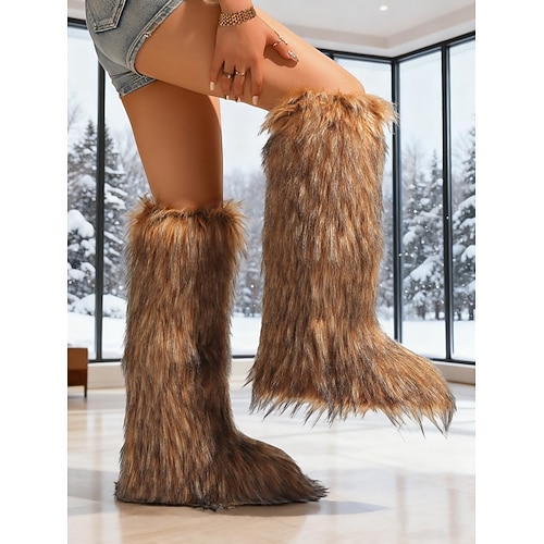 Pinkfarbene kniehohe Schneestiefel für Damen aus Kunstfell – stilvolles Winterschuhwerk, trendige Freizeitstiefel für kaltes Wetter und Outdoor-Abenteuer Image