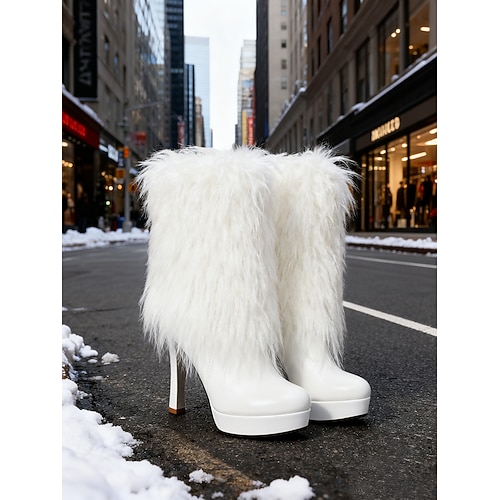 Schwarze Damen-Stiefeletten mit hohem Absatz und Kunstpelzbesatz – schicke Winterschuhe für modebewusste Damen, ideal für Alltag und Abend. Image