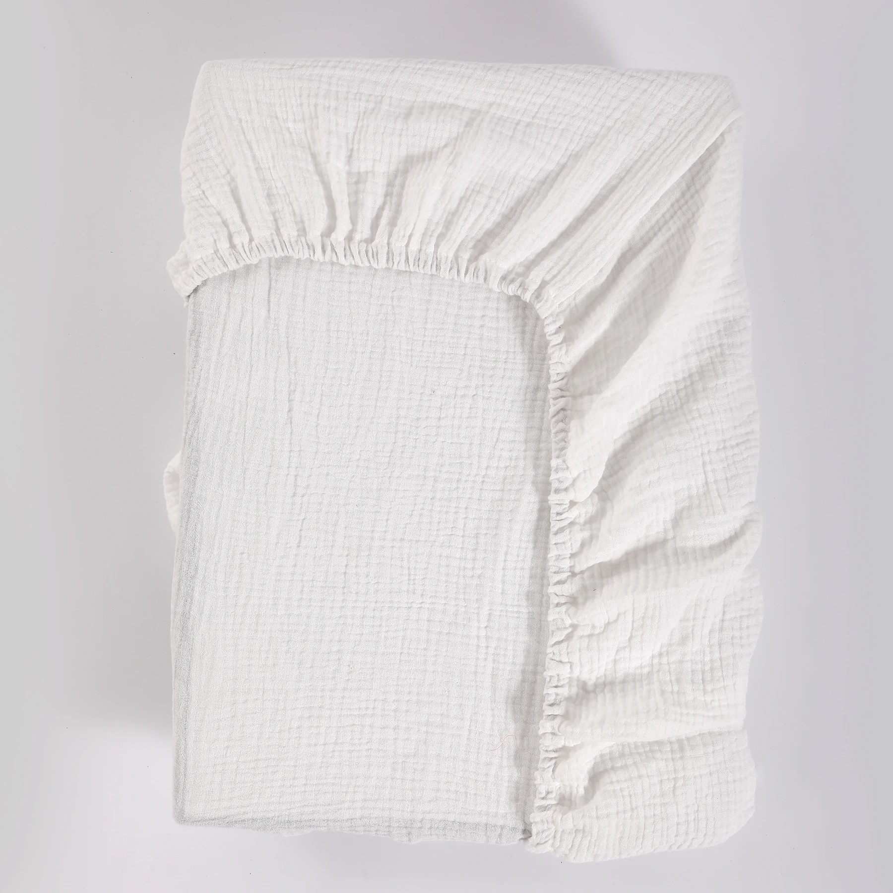 Weiche und atmungsaktive Musselin-Kinderbettlaken aus 100 % Baumwolle, weiße Babybettlaken Image