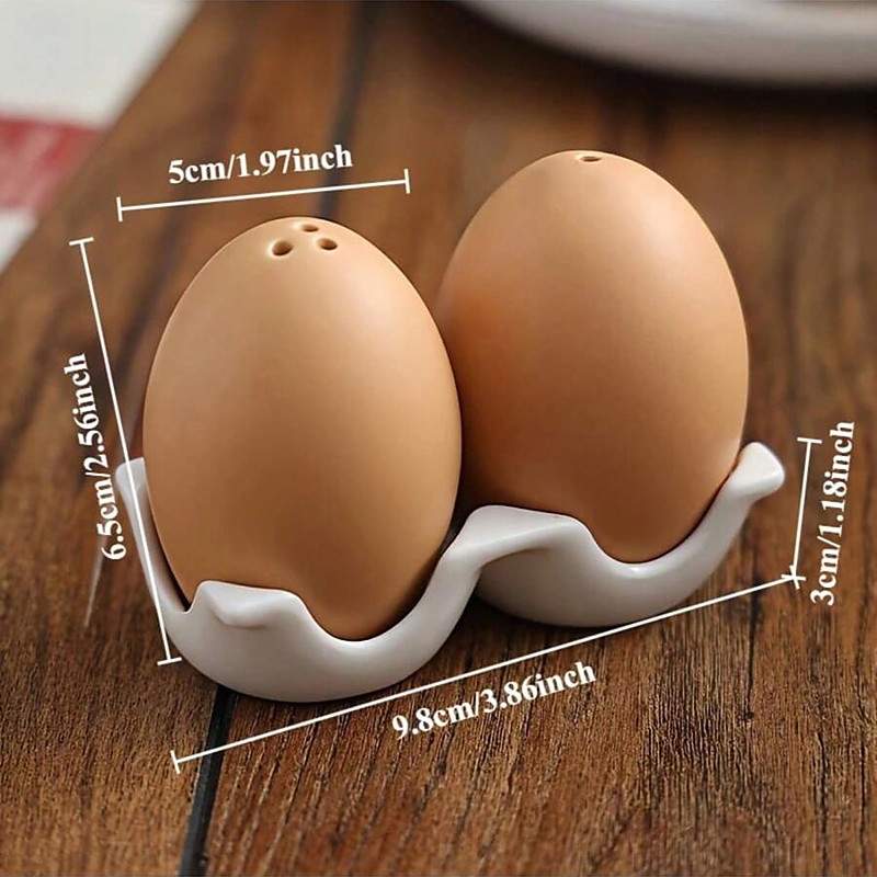 2-Piece Egg-Shaped Ceramic Jars Salt Pepper Shakers Unique Seasoning Containers Kitchen Spice Holders Perfect for outdoor picnics barbecues restaurants and kitchens Cute egg design distinctive