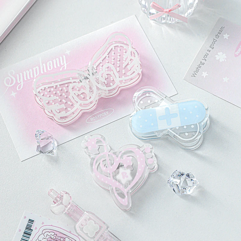 1 PC Kawaii Musiknote Flügel Acryl Buch Clip Lesehilfe Feste Buch Halter Lesezeichen Kreatives Design Praktisch für Buchhandlung Image