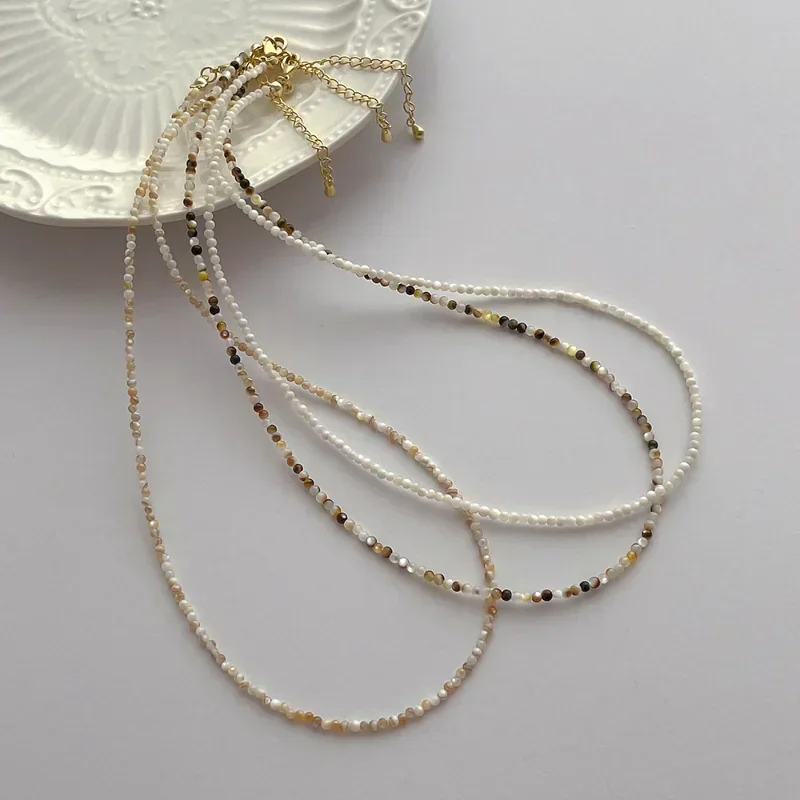 Minar Statement 2mm Mehrfarbige Runde Naturmuschel-Choker-Halsketten für Frauen, Perlenkette, Großhandel, Strand-Schmuck Image