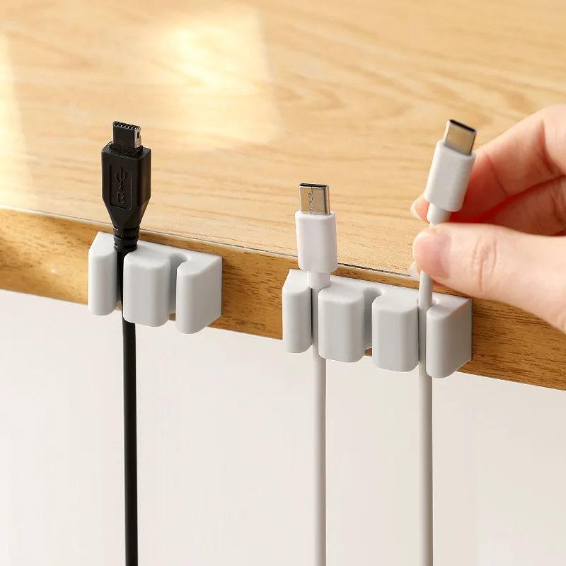 Datenkabelhalter, Desktop-Kabelmanagement, Speicher, Veredelung und Einfügen, Schnallennabe. Image