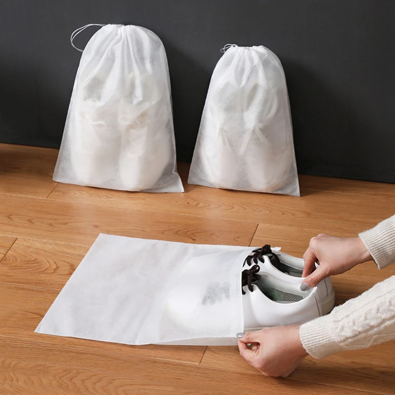 20/50 stücke Schuh Lagerung Tasche Einweg Vlies Schuh Waschen Tasche Kleine Weiße Schuh Staub Schuh Abdeckung