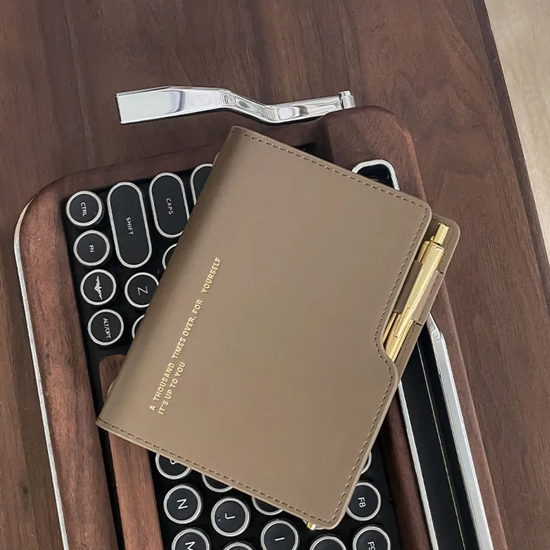 A7-Notizbuch mit losen Blättern, Ledergesicht, stilvolles Handkontobuch, Handkontobuch, tragbares Notizbuch Image