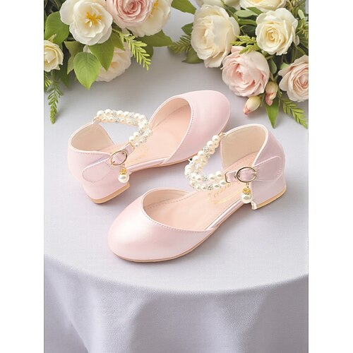 Elfenbeinfarbene Kinder-Blumenmädchenschuhe mit Perlenriemen, Strassverzierungen, weich gepolstertem, niedrigem Absatz und elegantem Prinzessinnenstil – perfekt für Hochzeiten und festliche Anlässe. Image