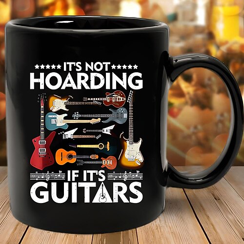 Witzige Geschenktasse „Gitarren sind kein Horten" – schwarze Keramik-Kaffeetasse, perfektes Geschenk für Gitarrenbegeisterte und Musikliebhaber, ideal für Musiker und Sammler. Image
