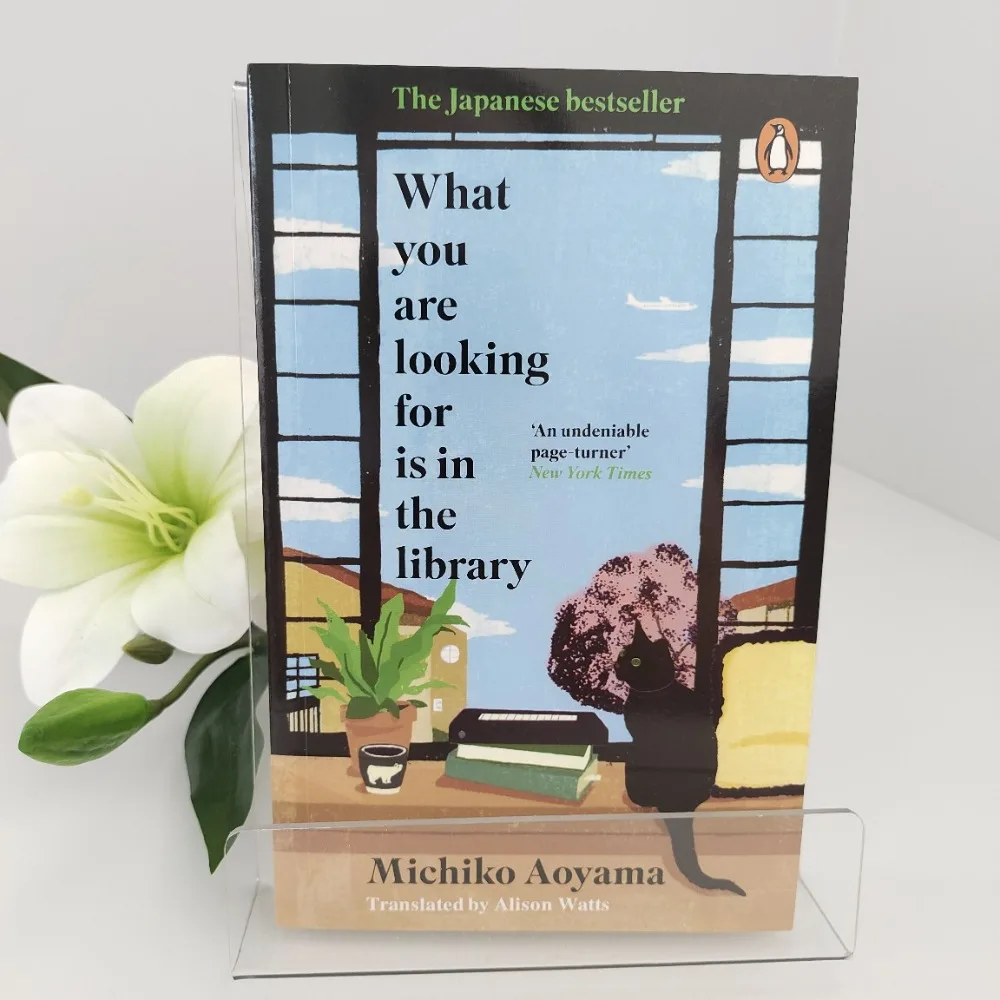 Was Sie suchen, in der Bibliothek von Michiko Aoyama | Ein heilender Roman über Bücher, Chance-Encounters und Antworten finden Image
