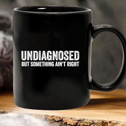 Lustige Geschenktasse mit Aufschrift „Unbekannt, aber irgendetwas stimmt nicht" – schwarze Keramik-Kaffeetasse, humorvoller Becher für Freunde, Kollegen, Büro oder Zuhause Image