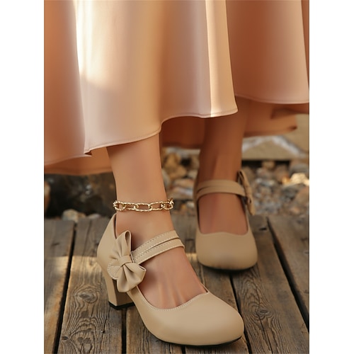Vintage-Mary-Jane-Pumps im Stil der 1950er-Jahre – elegante Pumps mit runder Zehenpartie, Blockabsatz und seitlicher Schleife – klassische Retro-Pin-up-Schuhe für formelle Anlässe Image