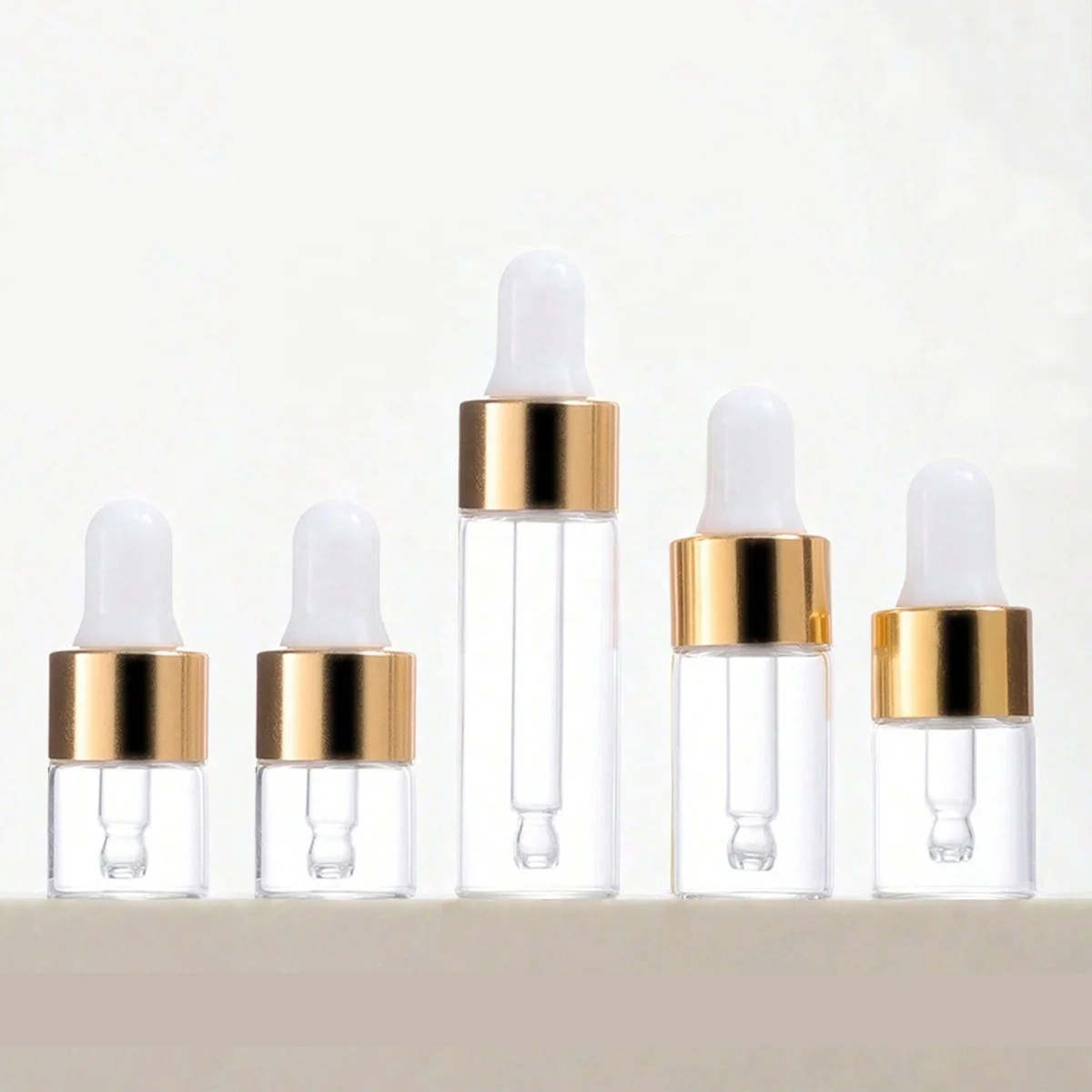 Mini flacone contagocce in vetro con siero trasparente 1ml 2ml 3ml 5ml flacone di olio essenziale di profumo di lusso cosmetico con contagocce d'oro