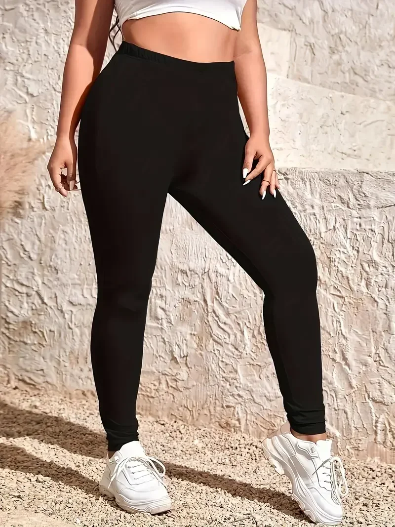 Plus Size Damen-Hosen mit hoher Taille, plus fette, einfarbige Hosen mit kleinen Füßen, schwarze High-Stretch-Leggings, tragen Neun-Punkt-Hosen Image