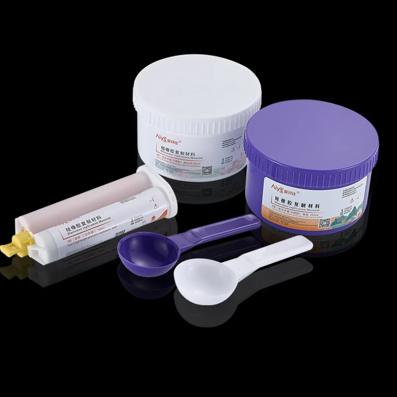 Material für zahnärztliche Labore. Leichtes/schweres Abdruckmaterial aus Silikonkautschuk Image