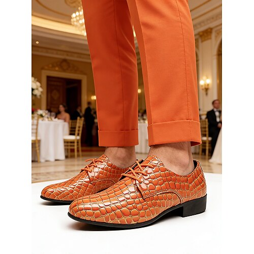 Gelbe Herren-Anzugschuhe mit Krokodilprägung, Schnürdesign aus Kunstleder, ausdrucksstarker Luxusstil, geeignet für formelle Anlässe, besondere Gelegenheiten und Hochzeiten. Image