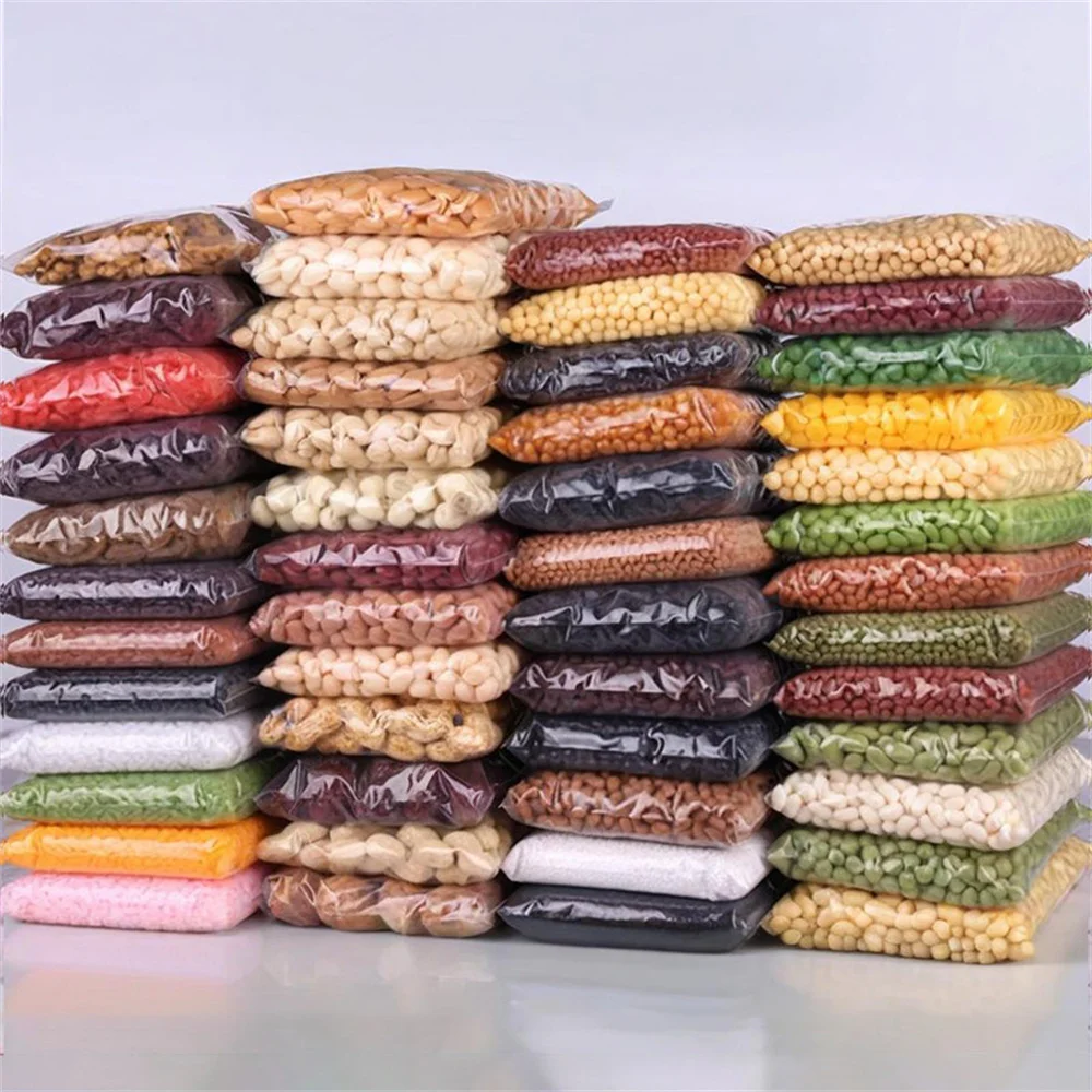 100 g/Packung Künstliche Simulationsnahrung Gefälschte Getreidearten Lotussamen Cashew Rosinen Weizen Reis Bohnen Erdnüsse Mais Mandeln Getrocknete Nüsse Modell Image