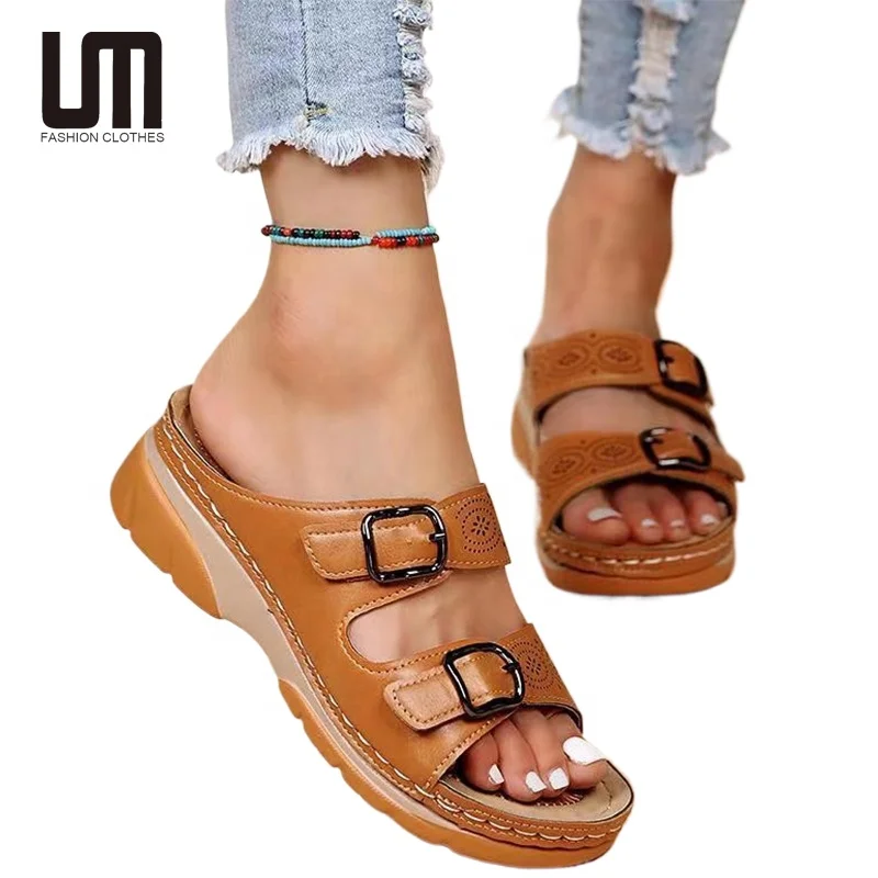 Liu Ming all'ingrosso 2024 donna moda con fibbia della cintura scarpe con plateau da esterno pantofole da passeggio aperte da donna sandali con zeppa