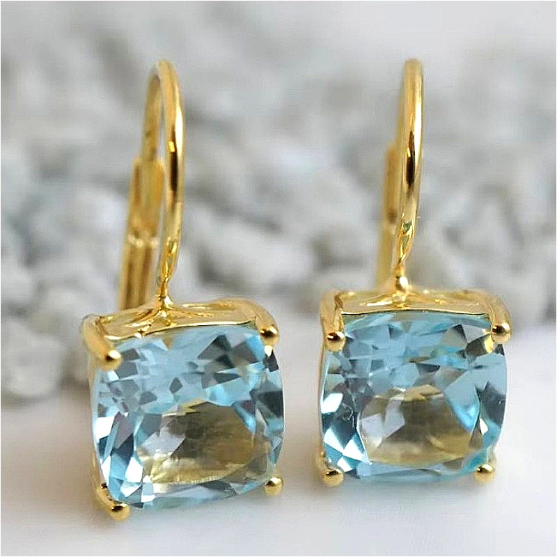 Luxuriöse, elegante blaue synthetische Zirkonia Goldene Hängeohrringe für Damen – Klassischer Modeschmuck für Bankett, Hochzeit und Jubiläum Image