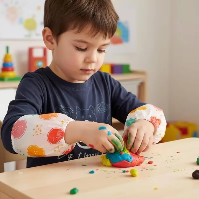 10–50 Paar Einweg-Armstulpen für Kinder, wasserdicht, Vliesstoff, Baby-Schutzhüllen, einzeln verpackt zum Füttern und Malen Image
