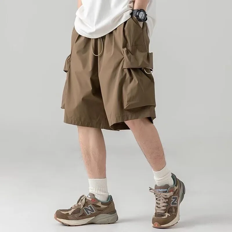 Neue Sommer-Cargo-Shorts für Herren, einfarbig, mit großen Taschen, modisch, elastisch, schnelltrocknend, für Sport, Fitness, Laufen