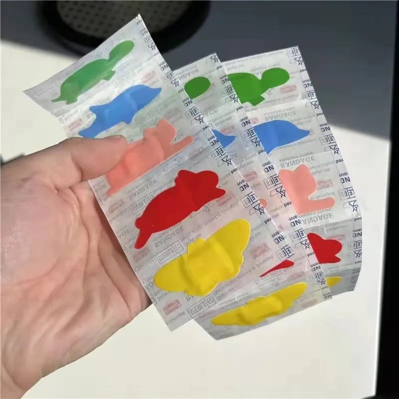 Niedliche Cartoon Tiere wasserdichte Klebe bandagen Pflaster Pflaster Pflaster Wunde Streifen Dressing für Kinder Erste-Hilfe-Kit Image