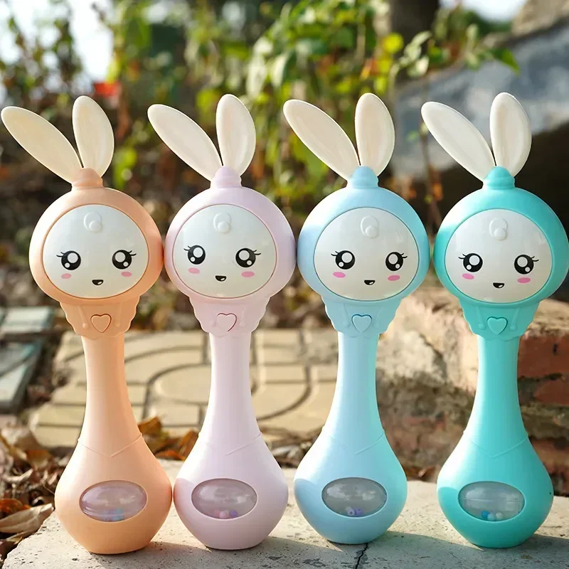 Baby Musik Blinkende Rassel Spielzeug Kaninchen Beißring Hand Glocken Mobile Infant Stop Weinen Tränen Rasseln Neugeborenen Frühen Pädagogisches Spielzeug 18M Image