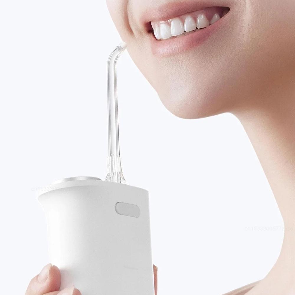 Portable Water Flosser Oral Irrigator With 4 Clean...