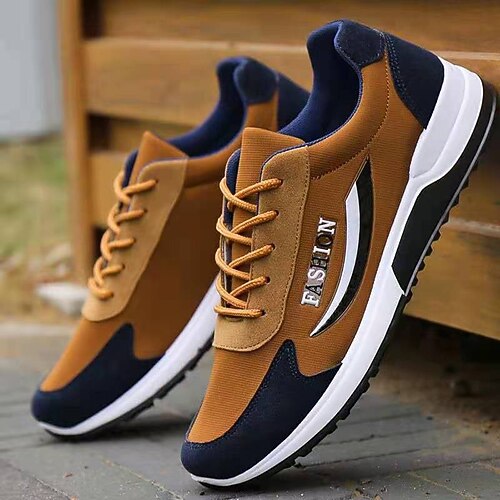 Lässige Herren-Sneaker in Hellbraun und Marineblau, leichte und bequeme Schnürschuhe, sportliche Low-Top-Schuhe für Alltag, Reisen, Wochenendausflüge und einen gepflegten Freizeitlook. Image