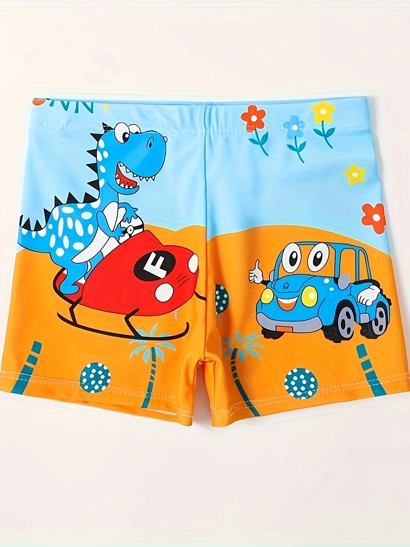 Schnell trocknende Badehose mit Cartoon-Dinosaurier-Fahrer- und Autopatroon für Jungen, Strandshorts mit elastischer Taille, Jungen-Badebekleidung für den Sommer Image