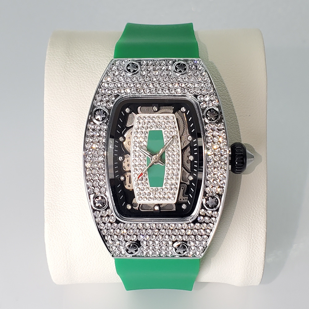Elegant Tonneau Watch For Women Featuring Dazzling Iced Out Watch Details And A Comfortable Rubber Strap Watch Design. silver Green