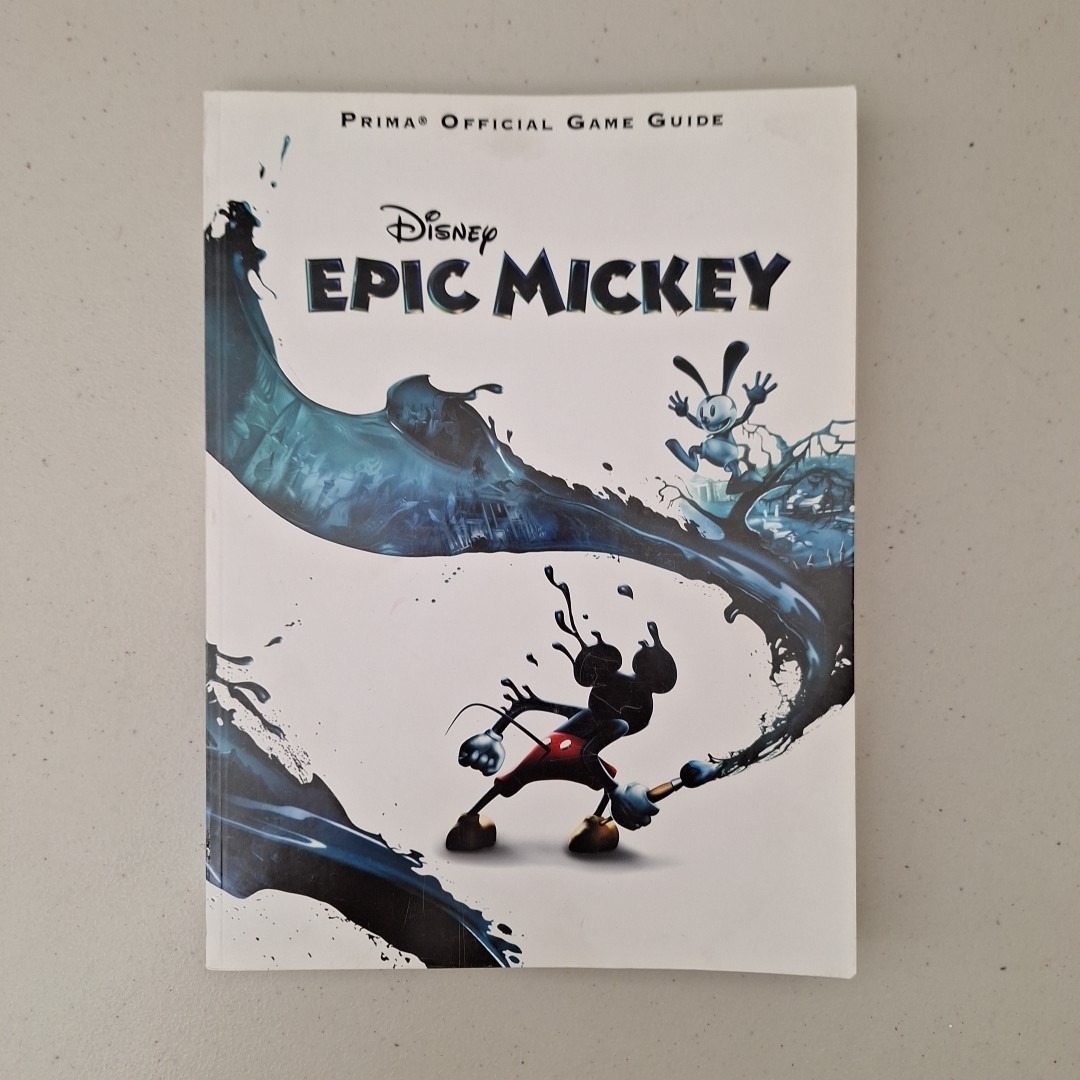 Disney Video Games & Consoles | Disney Epic Mickey Prima Official Game Guide Book | Color: Red | Size: Os