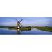 Panoramic Images PPI92252L Traditional Windmill On The Waterfront Netherlands Poster Print by Panoramic Images - 36 x 12