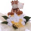 Neutral Baby Clothing Arrangement with Rattle Toy, Arragnement of Baby Clothing Presented As A Baby Bouquet