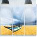 Design Art 'Fishing Boat on Beach w/ Dark Clouds' 3 Piece Photographic Print on Metal Set Metal in Blue | 28 H x 36 W x 1 D in | Wayfair MT14811-3P