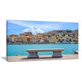 Design Art Seafront Bench in Port Santo Stefano - Wrapped Canvas Photograph Print Metal in Blue | 20 H x 40 W x 1 D in | Wayfair PT11360-40-20