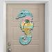 Designocracy Seahorse Scenic Beach Sunset Wooden Decorative Door Hanger Wood in Blue/Brown | 24 H x 18 W x 0.25 D in | Wayfair 8198517H