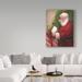 Trademark Fine Art 'Santa w/ a Gift' Acrylic Painting Print on Wrapped Canvas in Green/Red | 19 H x 14 W x 2 D in | Wayfair ALI31291-C1419GG