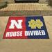 FANMATS House Divided - Nebraska/Notre Dame 42.5 in. x 33.75 in. Non-Slip Indoor Only Door Mat Synthetics in Blue/Red | 33.75 W x 42.5 D in | Wayfair