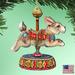 The Holiday Aisle® Carousel Bunny Shaped Wood Ornament Wood in Blue/Brown/Red | 5 H x 5 W x 1 D in | Wayfair EA222FCA8526478F8A6F4A99DD9C9FD3