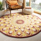 Yellow 48 x 0.5 in Indoor Area Rug - World Menagerie Round Swind Floral Handmade Tufted Wool Rust/Gold Area Rug Wool | 48 W x 0.5 D in | Wayfair